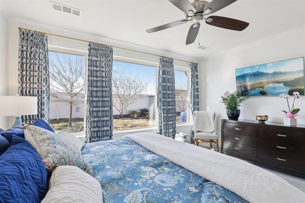 9716 Silver Rock Way Denton, TX 76207 - Photo 11 of 25 a living room with furniture and a large window