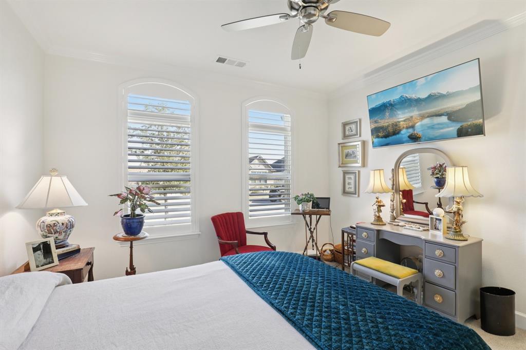 9716 Silver Rock Way Denton, TX 76207 - Photo 16 of 25 a bedroom with furniture and a large window