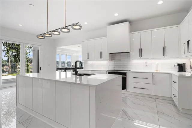 a bathroom with a toilet and a mirror