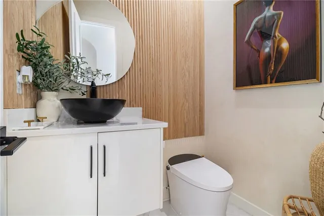 a living room with furniture a table and large window