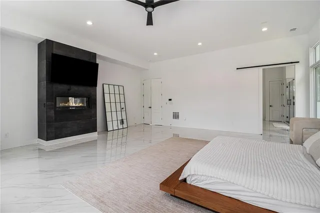 a bathroom with a double vanity sink and mirror