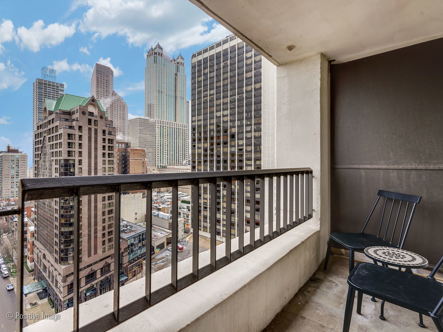 1030 North State Street, Unit 13E Chicago, IL 60610 - Photo 17 of 26 a view of a balcony with chair