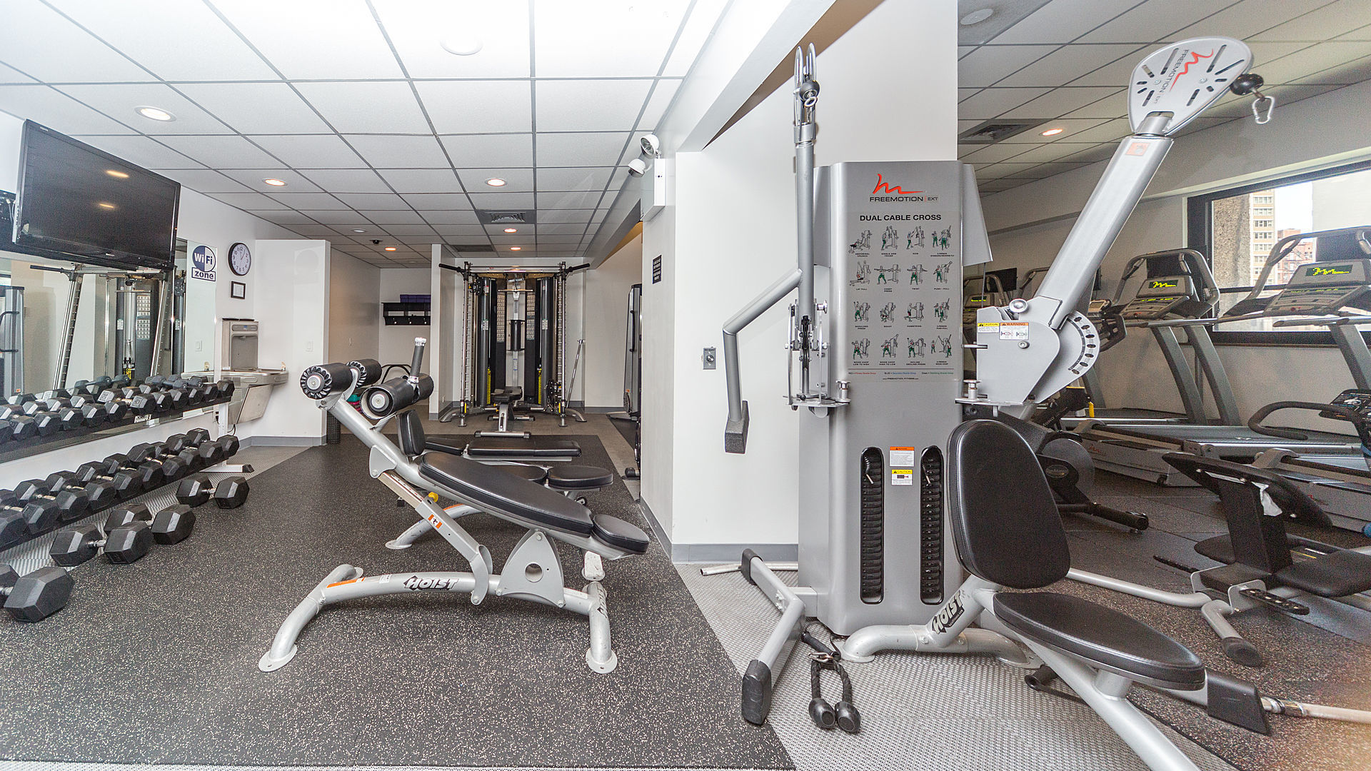 1030 North State Street, Unit 13E Chicago, IL 60610 - Photo 22 of 26 a view of a room with gym equipment