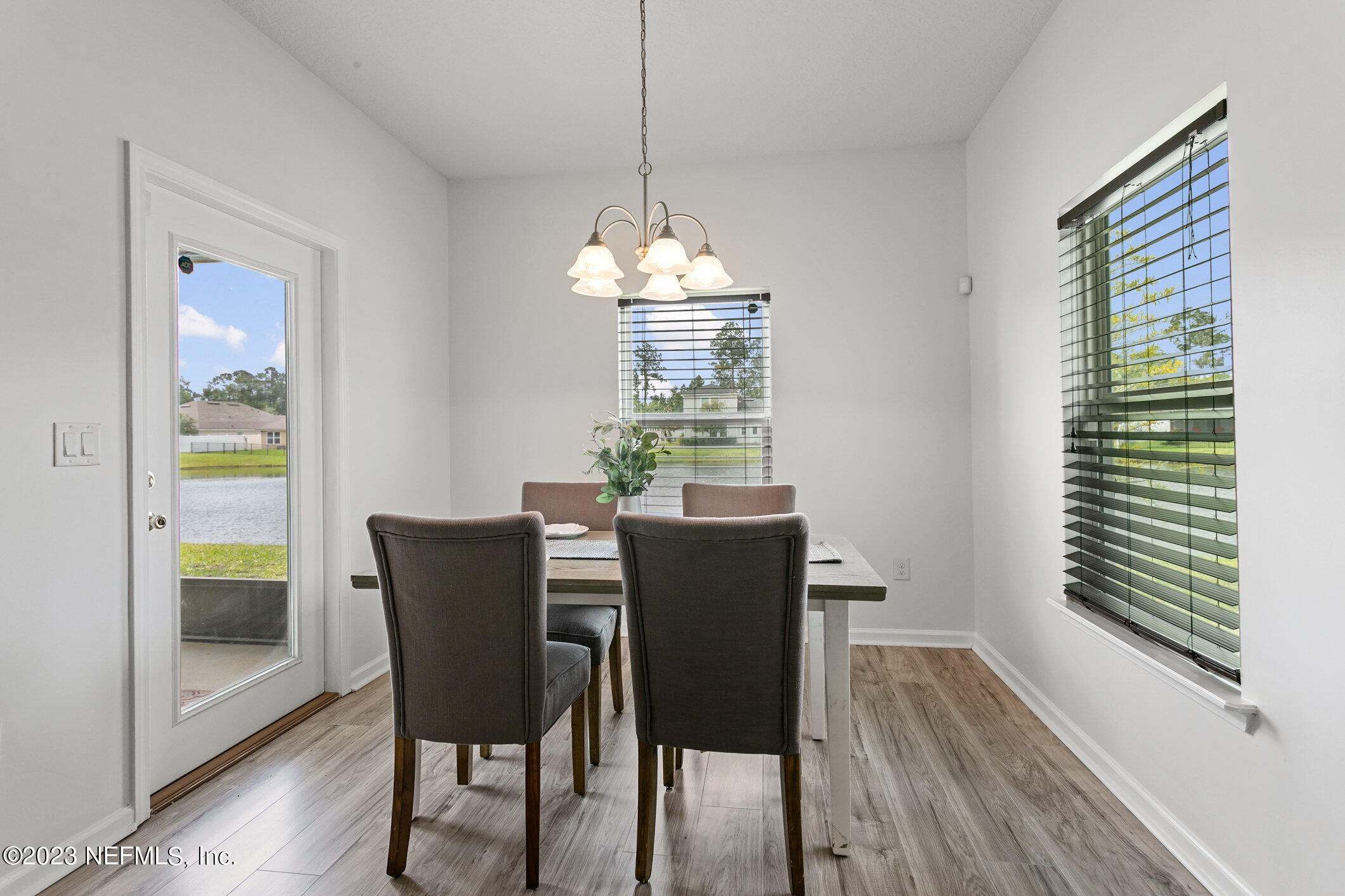 9864 Sailor Drive Jacksonville, FL 32221 - Photo 19 of 44 a dining room with furniture and window