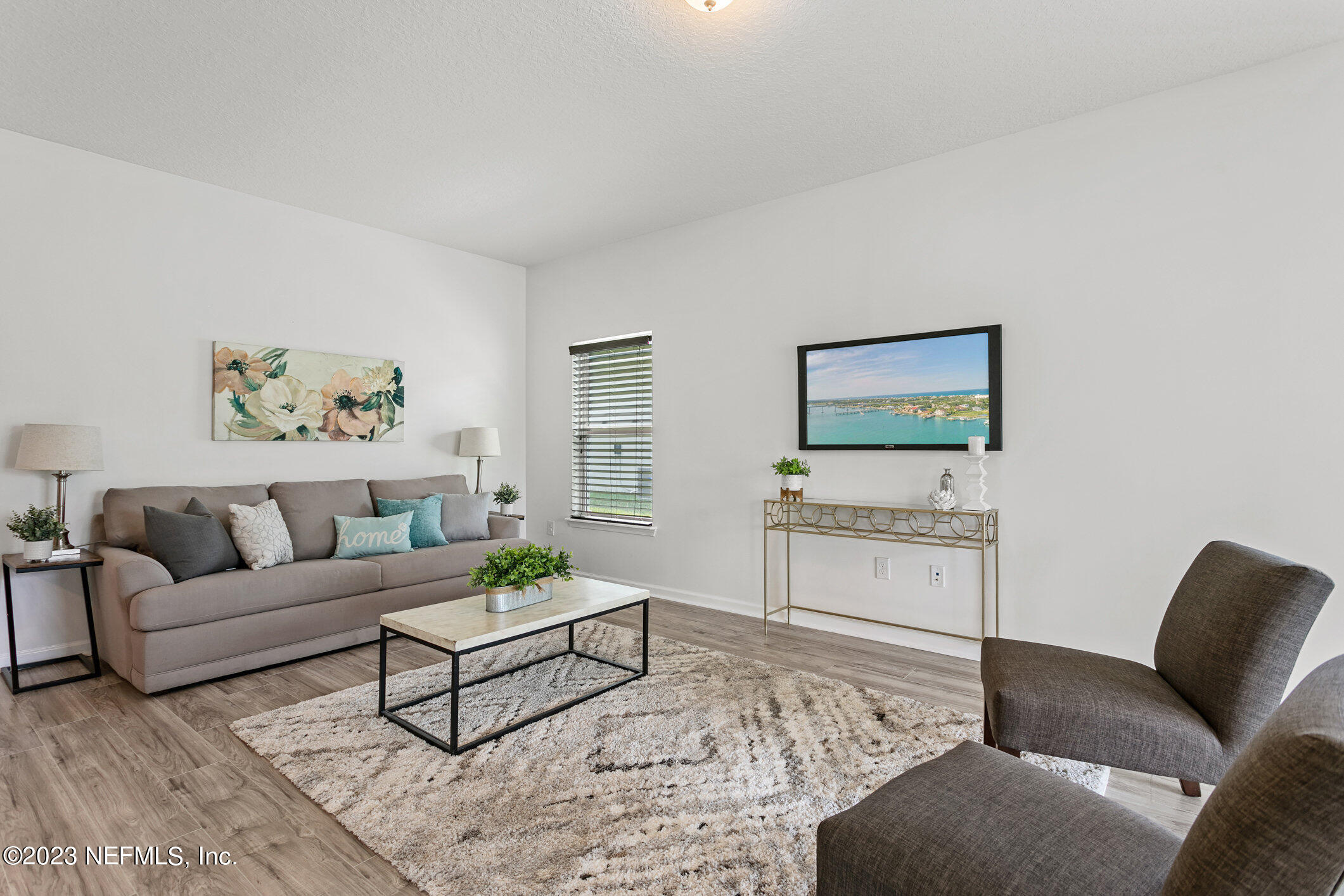 9864 Sailor Drive Jacksonville, FL 32221 - Photo 23 of 44 a living room with furniture and a couch
