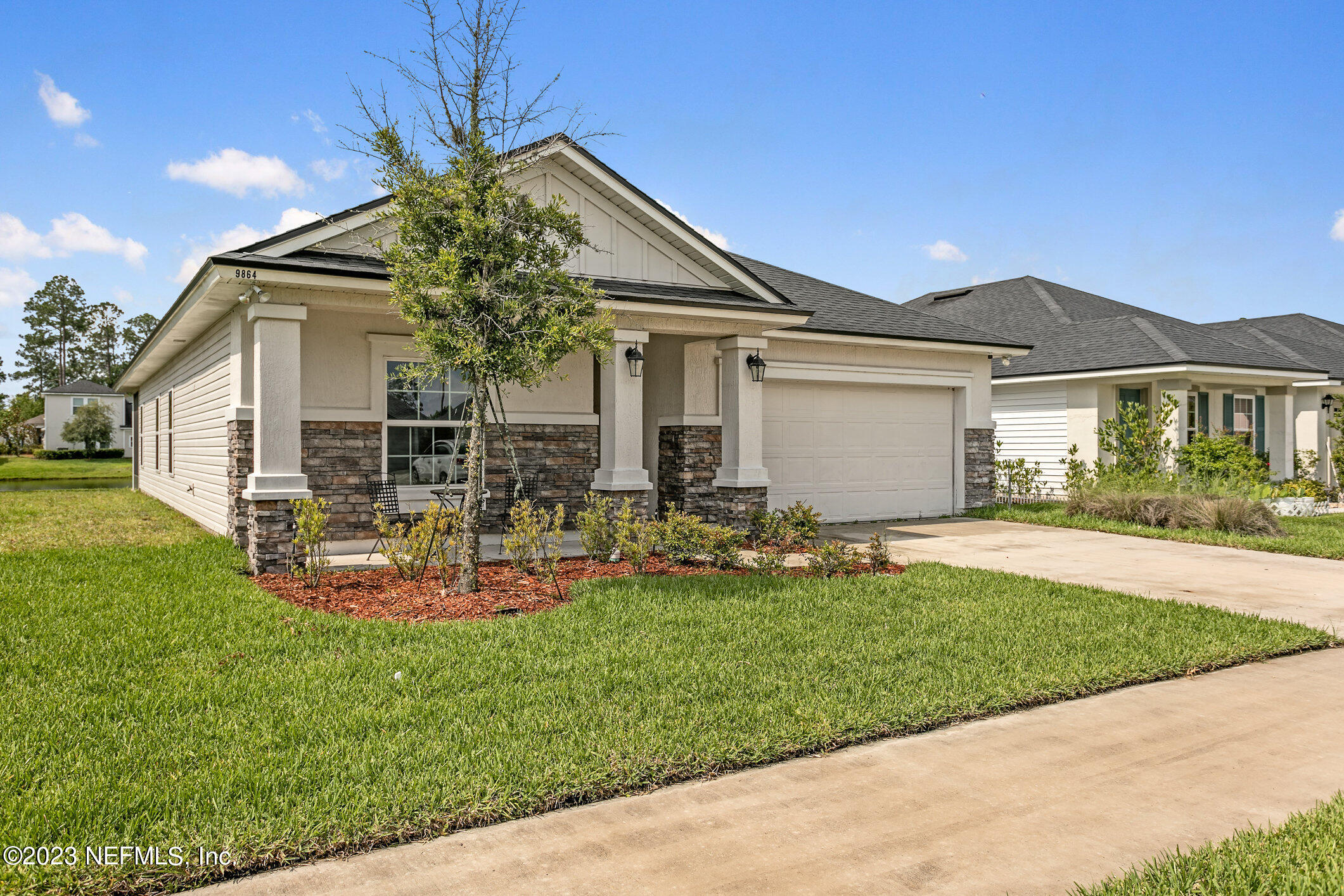 9864 Sailor Drive Jacksonville, FL 32221 - Photo 5 of 44 a view of a house with backyard porch and sitting area