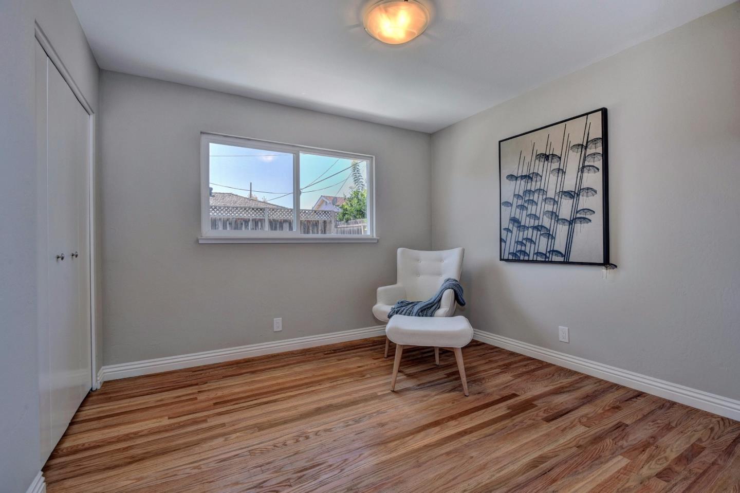 4528 Piper Drive San Jose, CA 95129 - Photo 12 of 15 a chair and table in a room