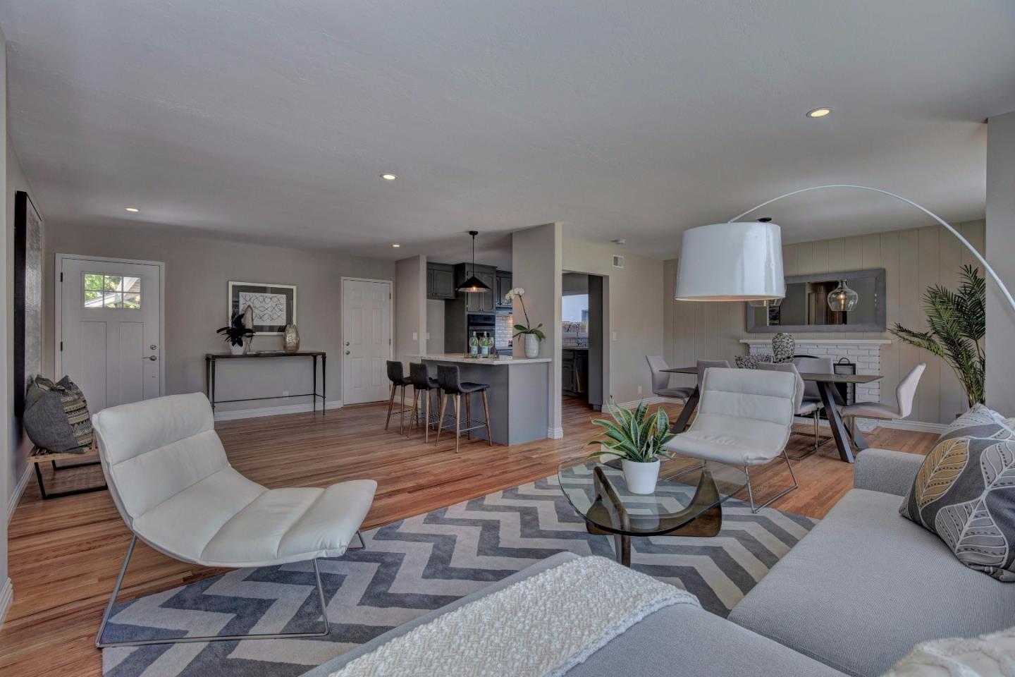 4528 Piper Drive San Jose, CA 95129 - Photo 5 of 15 a living room with furniture and wooden floor