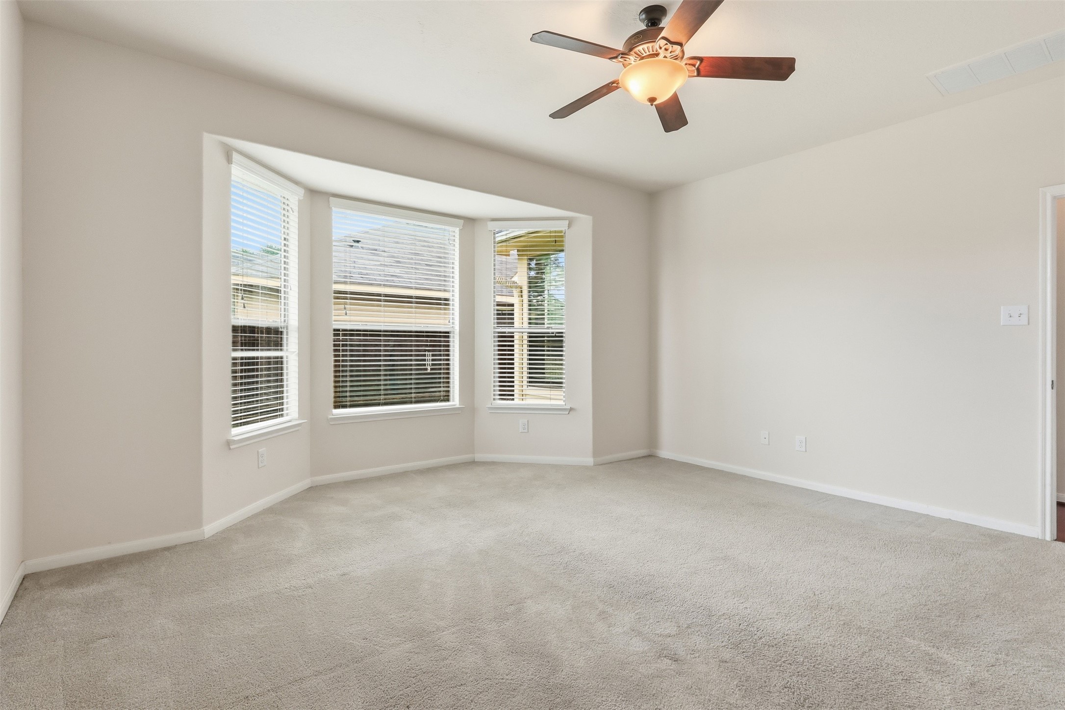1911 Vale Brook Drive Spring, TX 77373 - Photo 14 of 27 Enjoy plenty of space for large furniture while taking in views of the backyard through the bay windows.