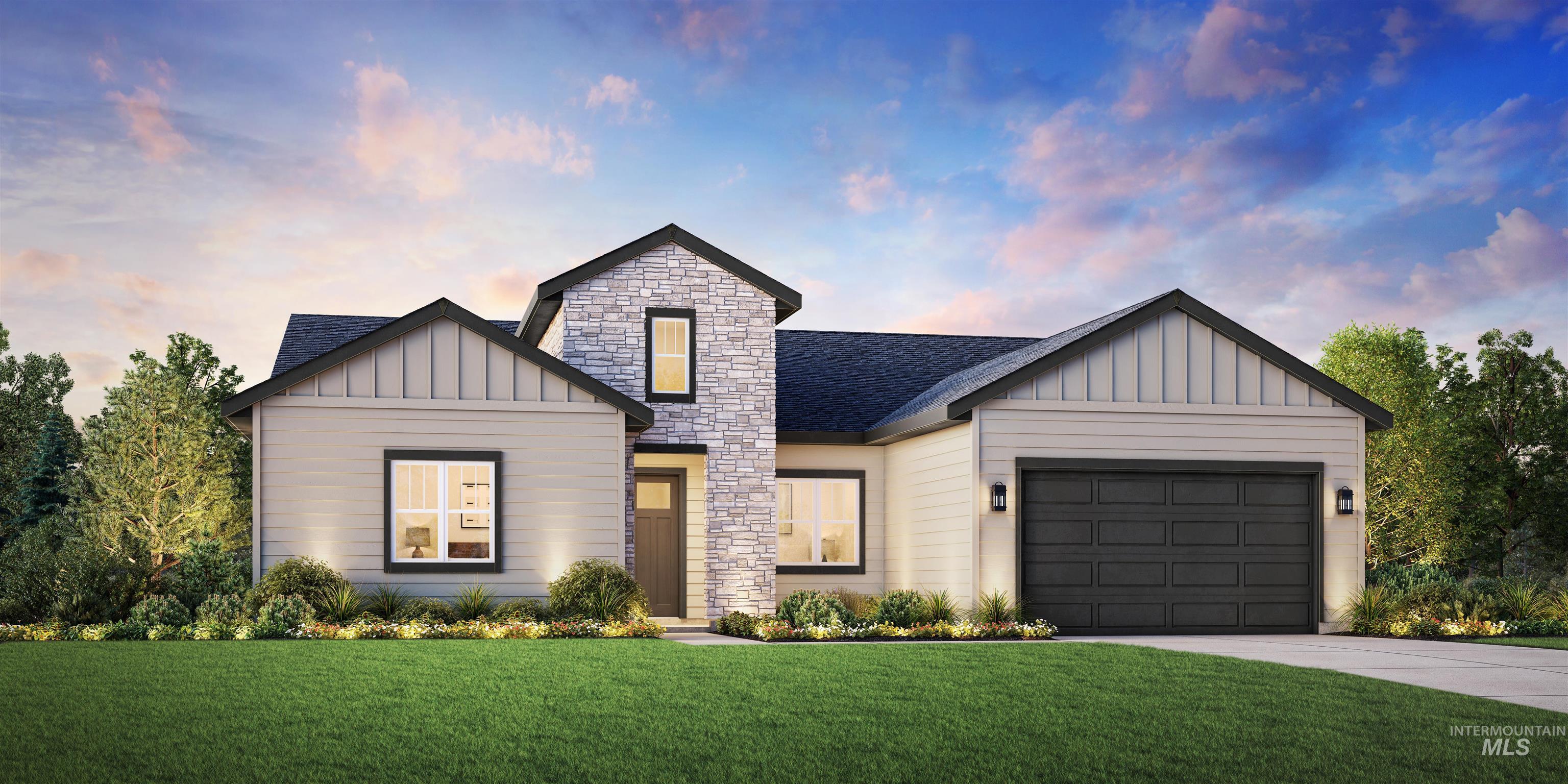 Modern farmhouse featuring board and batten siding, stone siding, a lawn, concrete driveway, and a garage