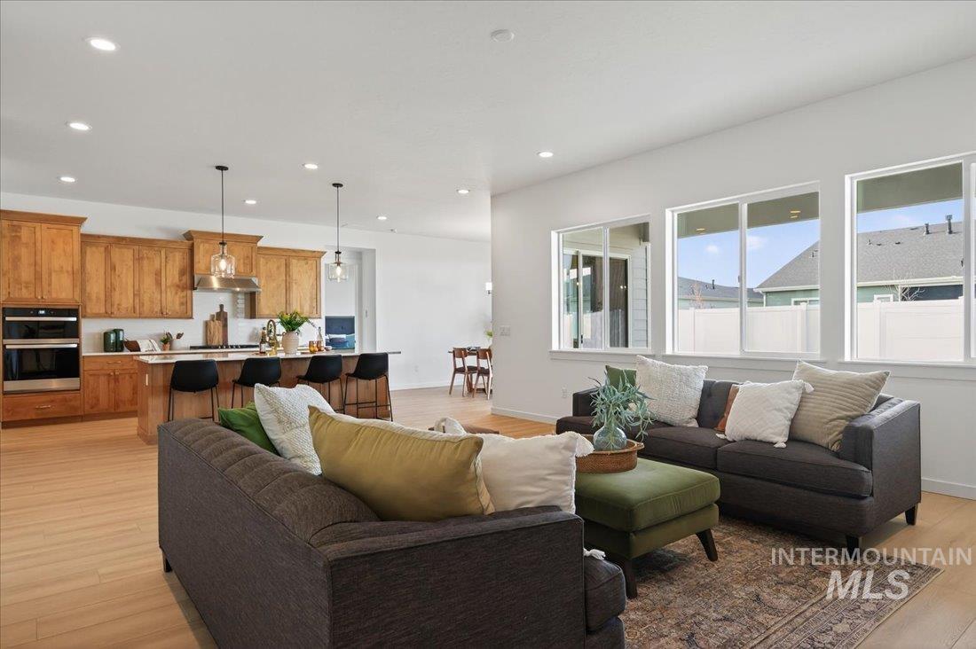14675 Serenity Pt Street Caldwell, ID 83607 - Photo 4 of 14 Living room featuring recessed lighting and light wood-type flooring