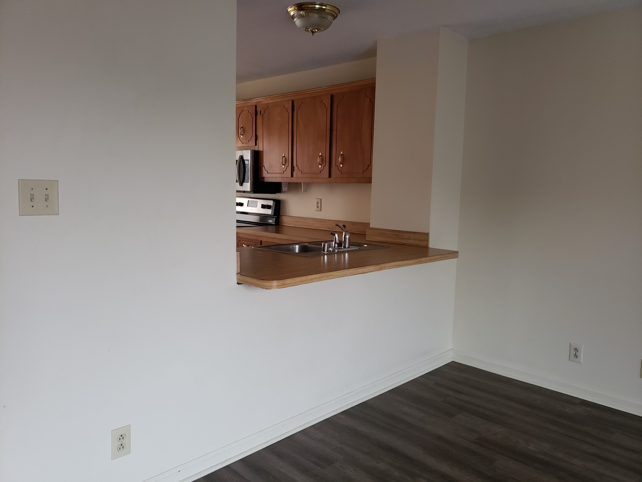 200 Tree Line Drive Oak Grove, KY 42262 - Photo 11 of 58 a view of kitchen island with wooden floor