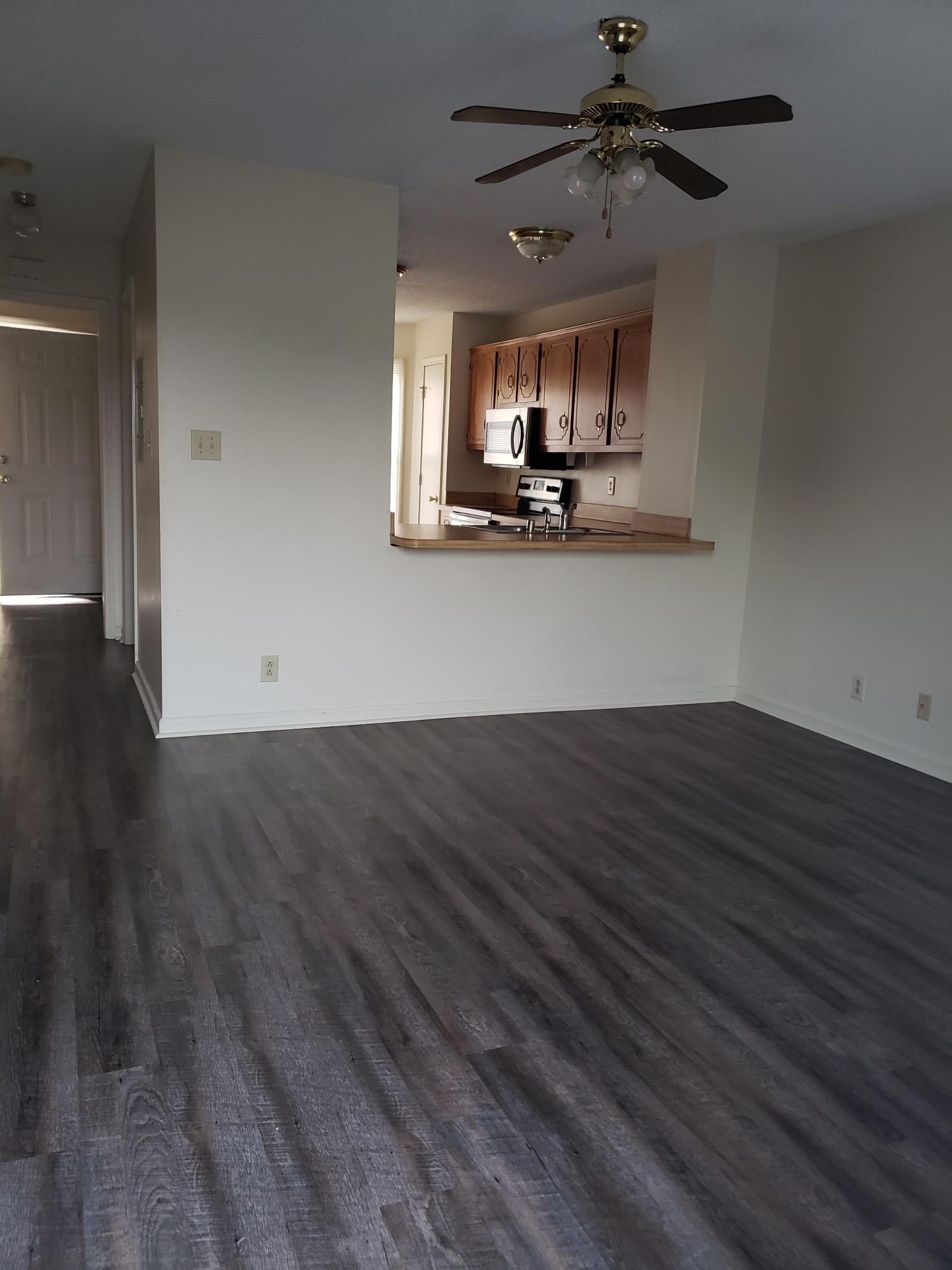 200 Tree Line Drive Oak Grove, KY 42262 - Photo 13 of 58 a view of kitchen with wooden floor and window