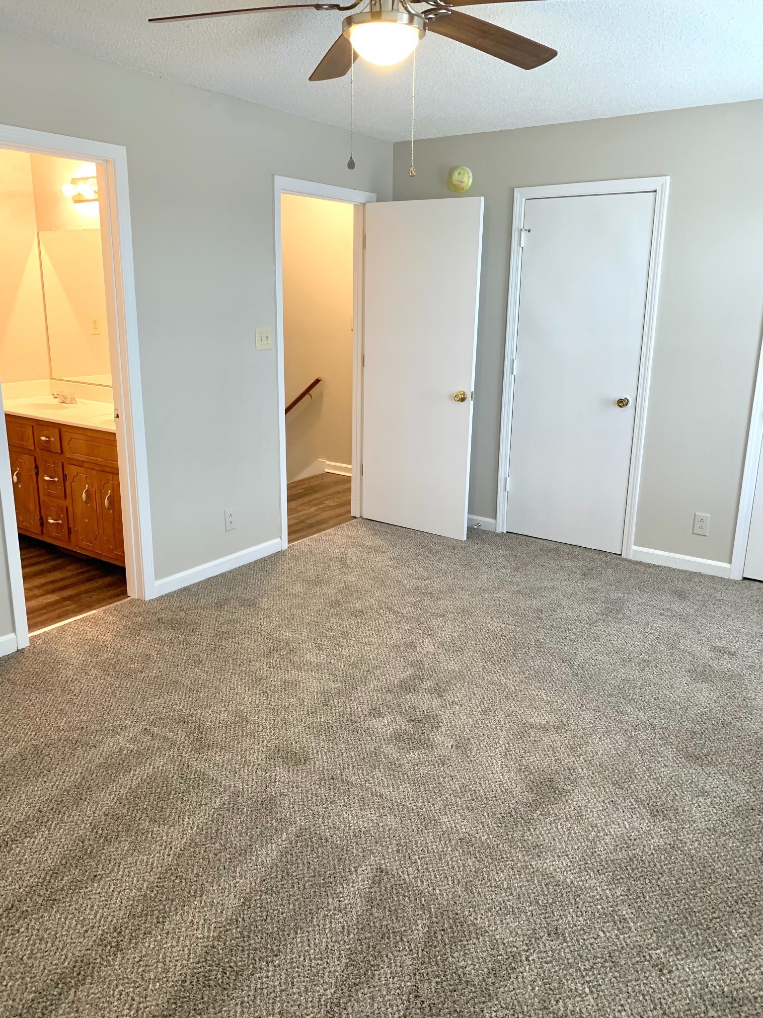 200 Tree Line Drive Oak Grove, KY 42262 - Photo 45 of 58 an empty room with a window and chandelier fan