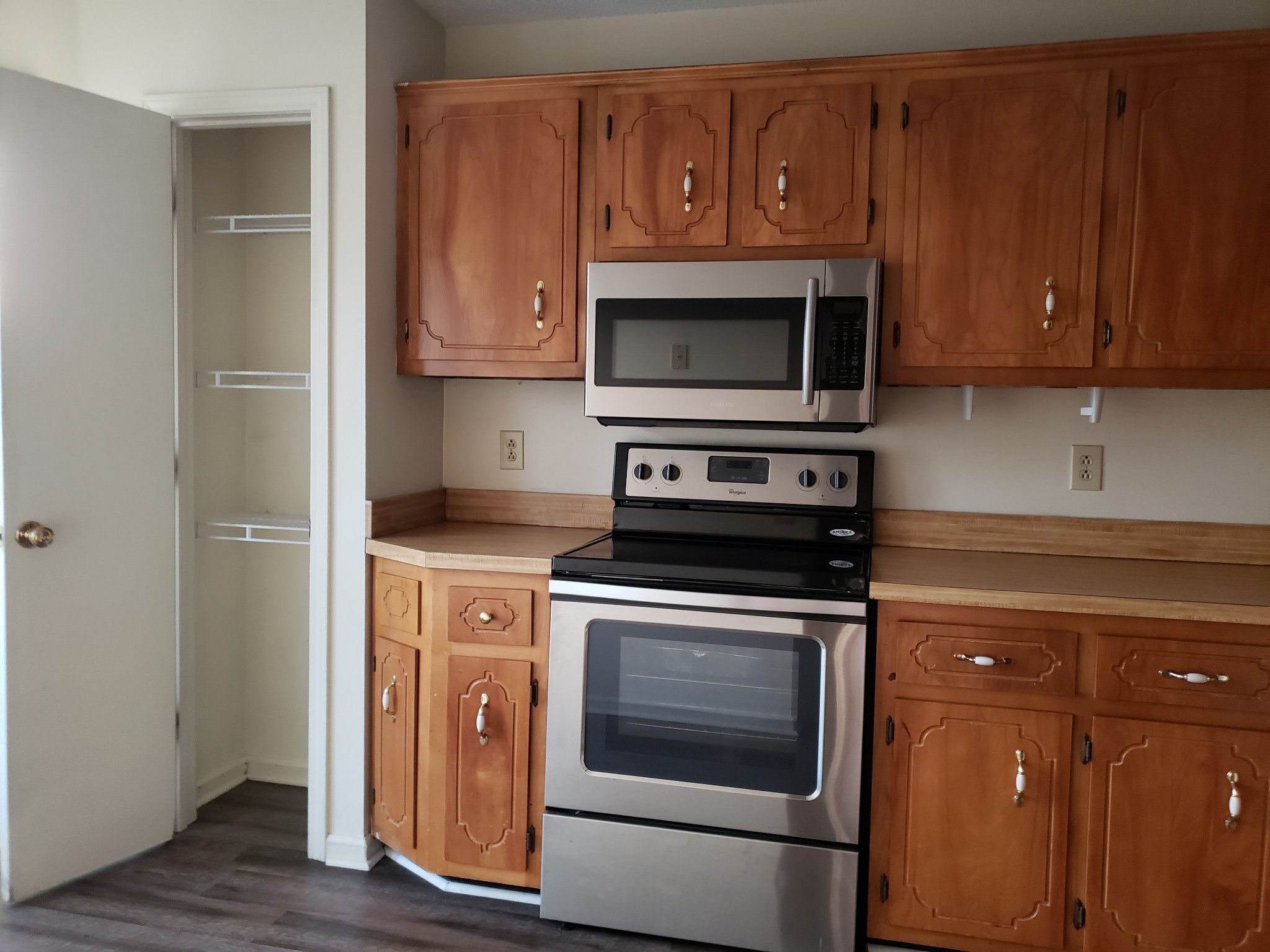 200 Tree Line Drive Oak Grove, KY 42262 - Photo 52 of 58 a kitchen with wooden cabinets stainless steel appliances and wooden cabinets