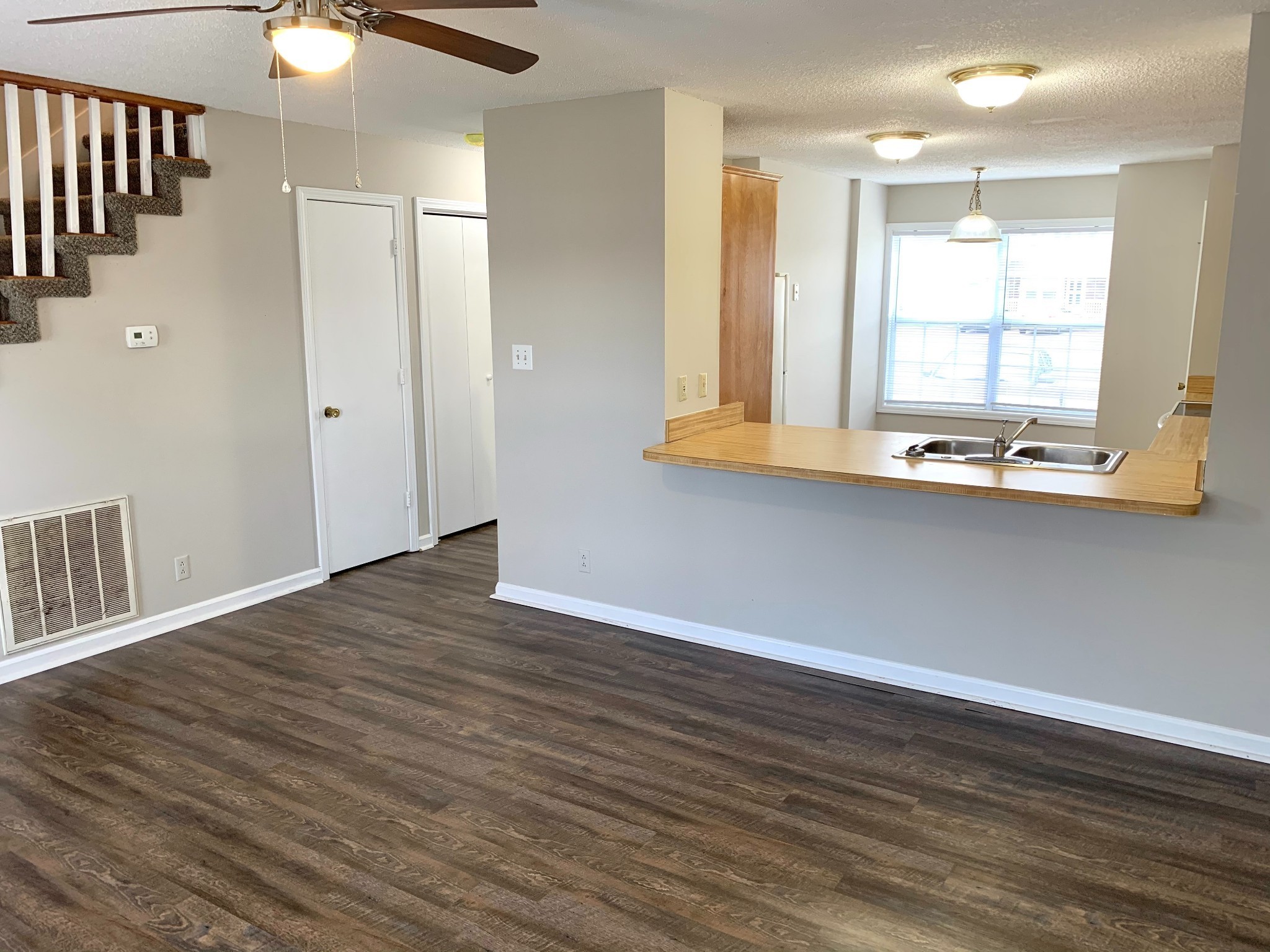 200 Tree Line Drive Oak Grove, KY 42262 - Photo 56 of 58 a view of an empty room with wooden floor and a window