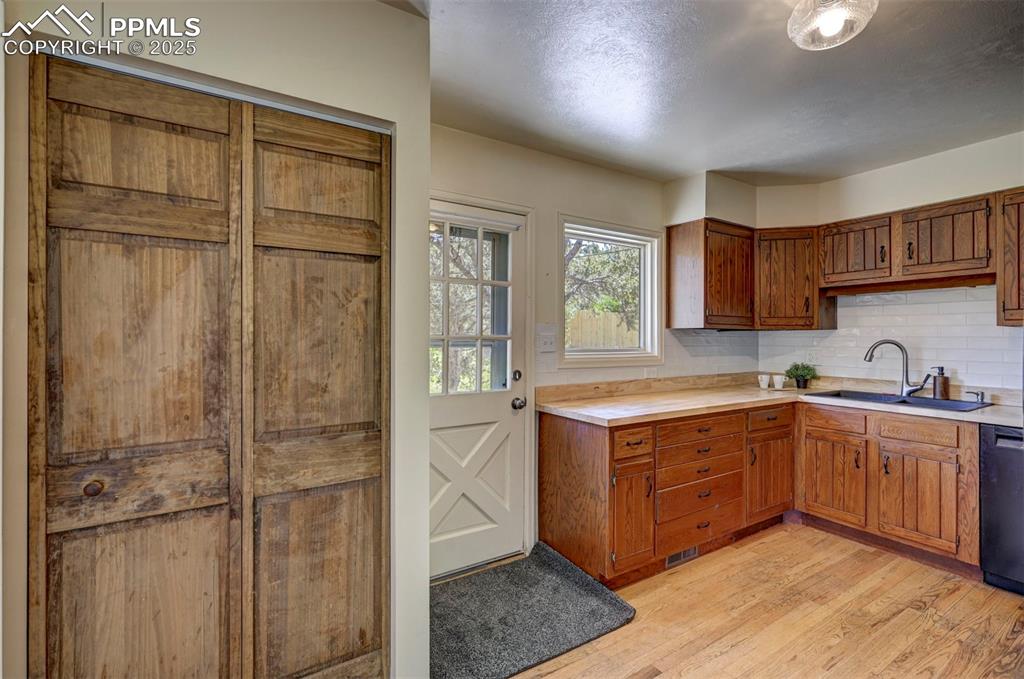 4665 Fox Road Cascade, CO 80809 - Photo 17 of 50 a kitchen with a cabinets and sink