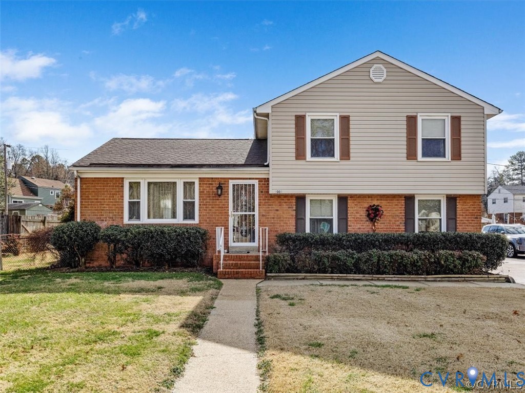 9003 Hungary Road Henrico, VA 23294 - Photo 1 of 25 Brick and siding exterior with a gabled roof