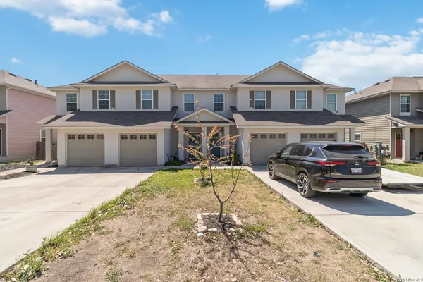 a car parked in front of a house