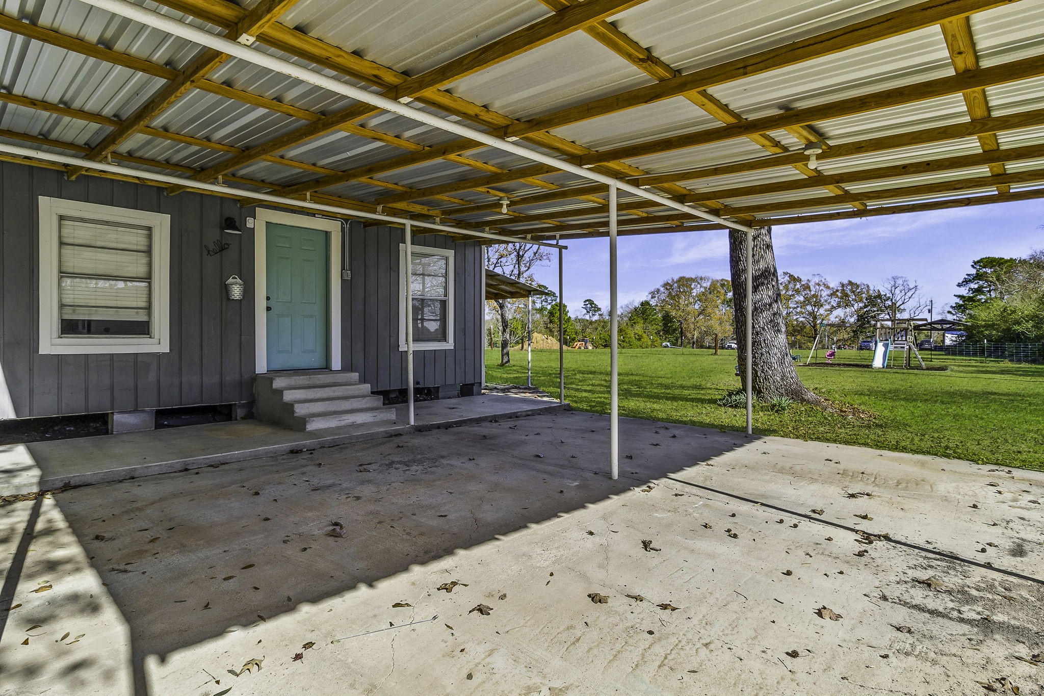 180 Ellis Lovett Road Shepherd, TX 77371 - Photo 3 of 24 Side Attached Carport