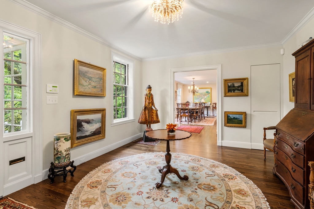 21 Sargent Crossway Brookline, MA 02445 - Photo 16 of 36 a living room with fireplace furniture and a flat screen tv