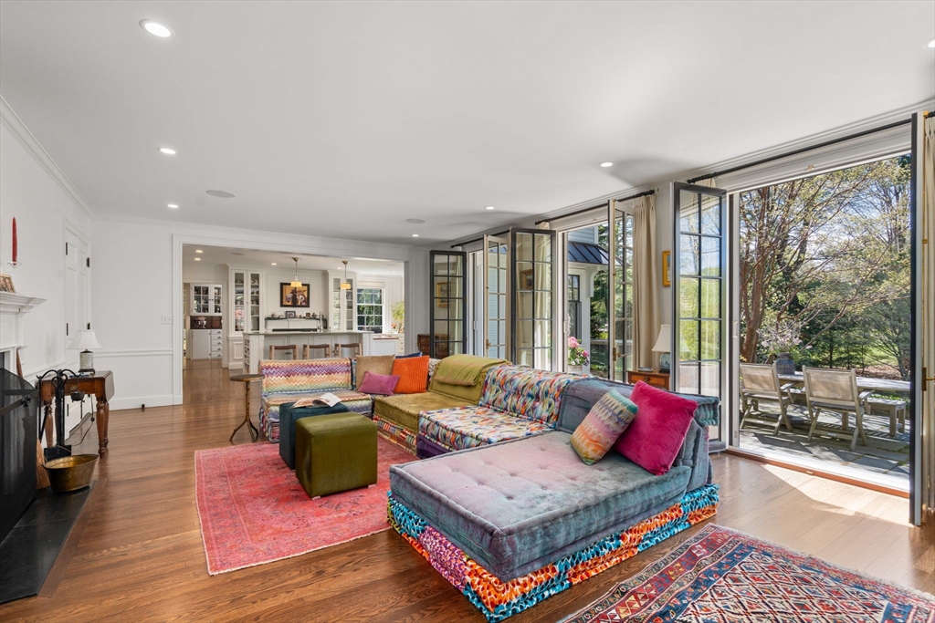 21 Sargent Crossway Brookline, MA 02445 - Photo 17 of 36 a living room with furniture and a large window