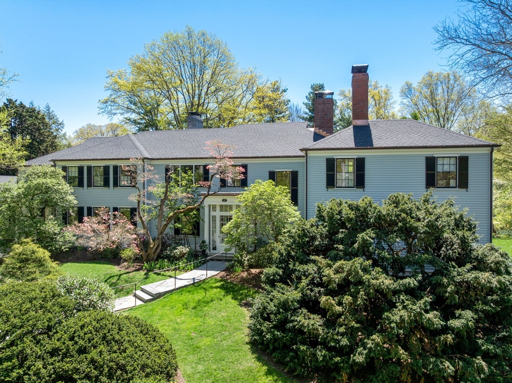 21 Sargent Crossway Brookline, MA 02445 - Photo 2 of 36 a front view of a house with a yard