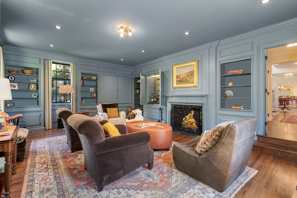 21 Sargent Crossway Brookline, MA 02445 - Photo 25 of 36 a living room with furniture and a fireplace
