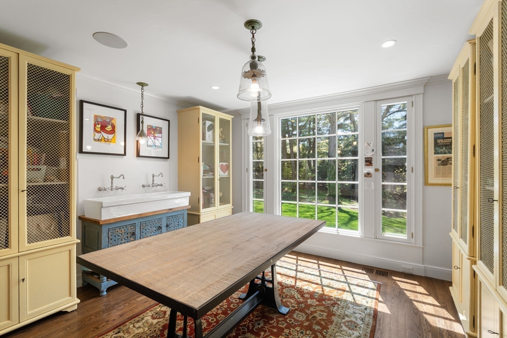 21 Sargent Crossway Brookline, MA 02445 - Photo 28 of 36 a view of a dining room with furniture window and wooden floor