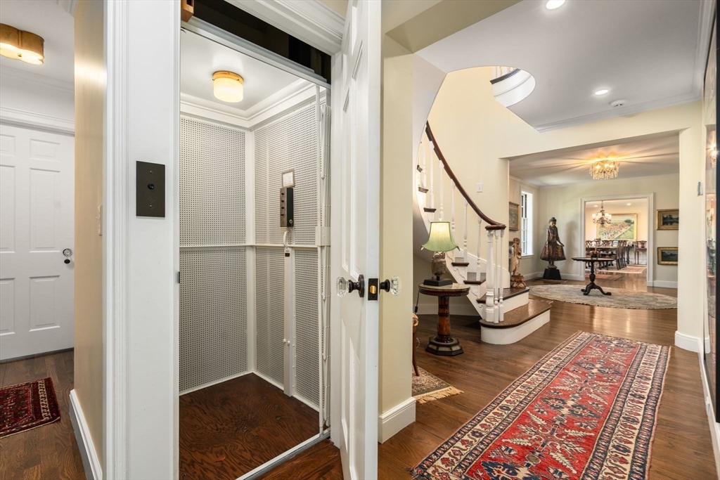21 Sargent Crossway Brookline, MA 02445 - Photo 29 of 36 a view of a living room and a livingroom with furniture