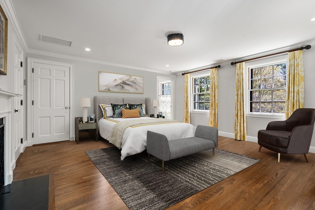 21 Sargent Crossway Brookline, MA 02445 - Photo 30 of 36 a bedroom with a large bed and a couch