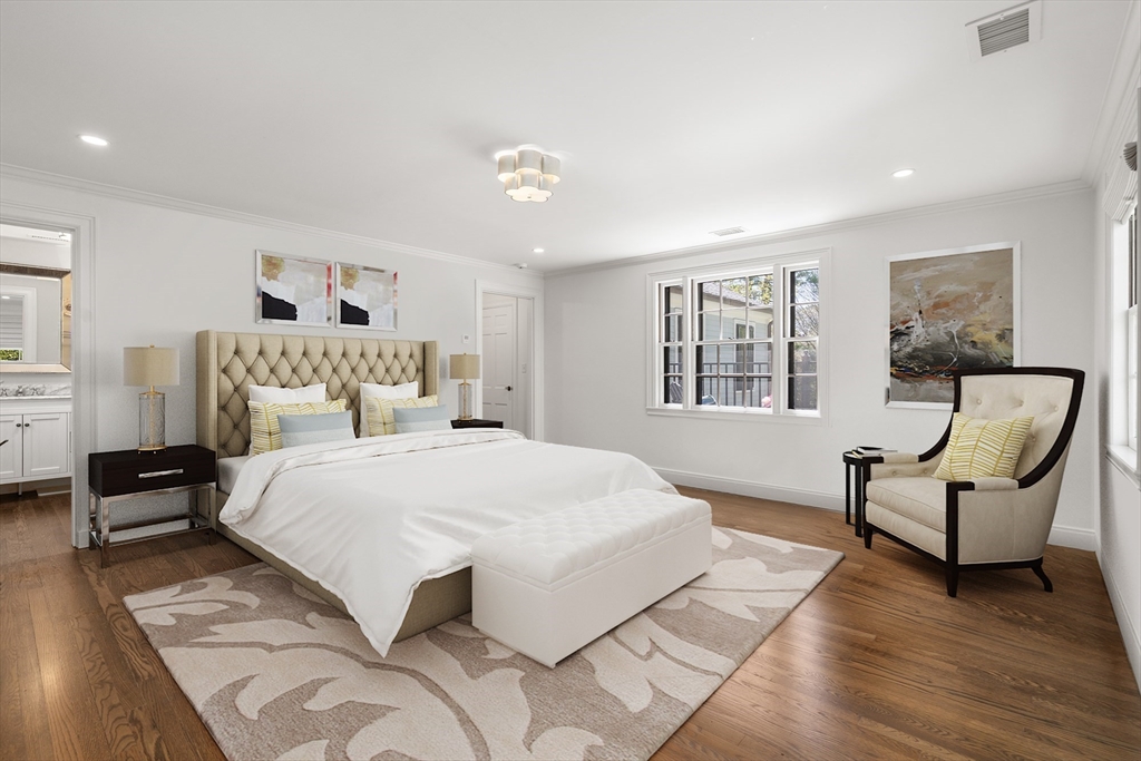 21 Sargent Crossway Brookline, MA 02445 - Photo 32 of 36 a bedroom with a bed and wooden floor