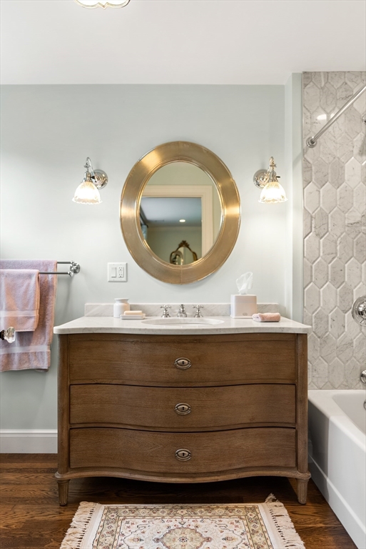 21 Sargent Crossway Brookline, MA 02445 - Photo 35 of 36 a bathroom with a sink a mirror and bathtub