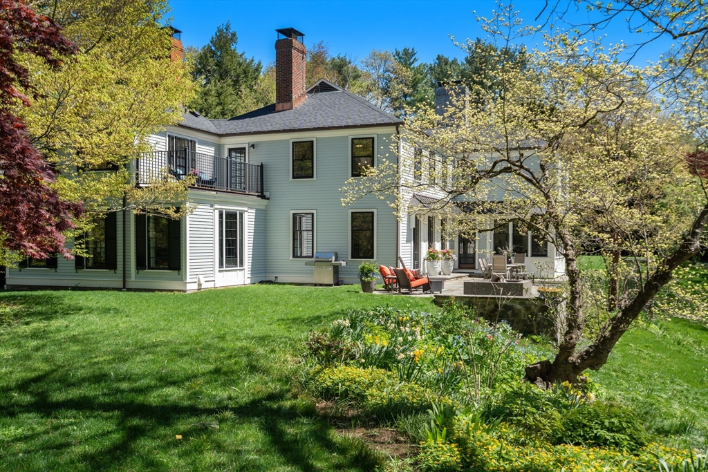 21 Sargent Crossway Brookline, MA 02445 - Photo 4 of 36 a front view of a house with a yard