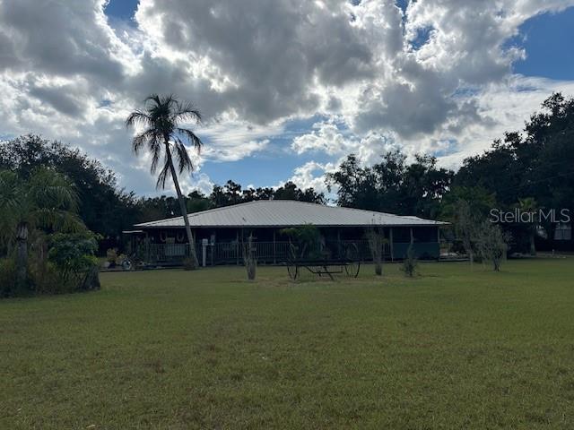 10102 Loetscher Lane Lithia, FL 33547 - Photo 2 of 6 a view of a backyard