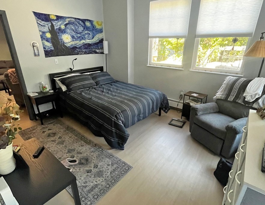 135 Main Street Upton, MA 01568 - Photo 12 of 19 a bedroom with a bed and a couch