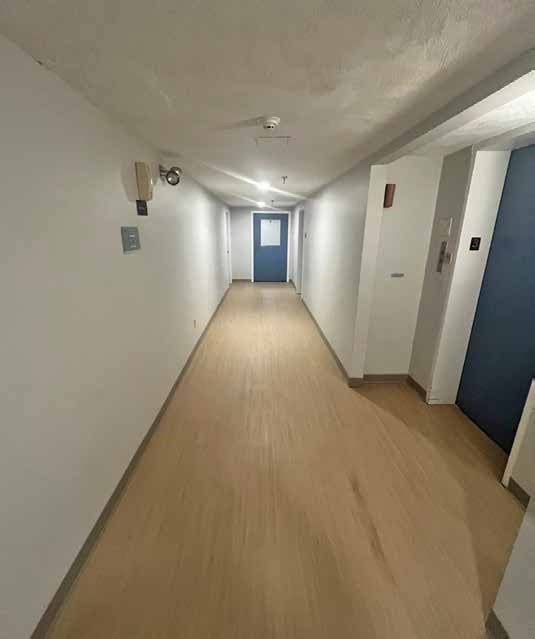 135 Main Street Upton, MA 01568 - Photo 16 of 19 a view of a livingroom with a staircase