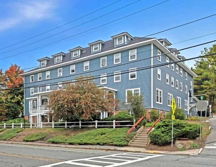 135 Main Street Upton, MA 01568 - Photo 3 of 19 a front view of a building