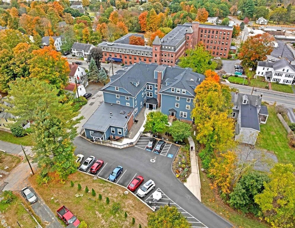 135 Main Street Upton, MA 01568 - Photo 5 of 19 an aerial view of a house