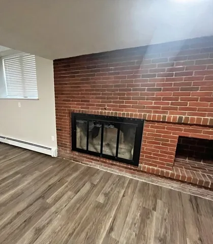 a bed room with a bed and windows