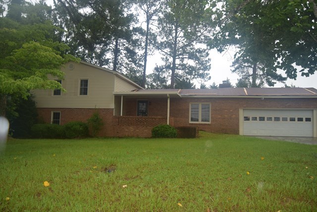 1608 Macon Road Perry, GA 31069 - Photo 11 of 11 a view of a house with a yard
