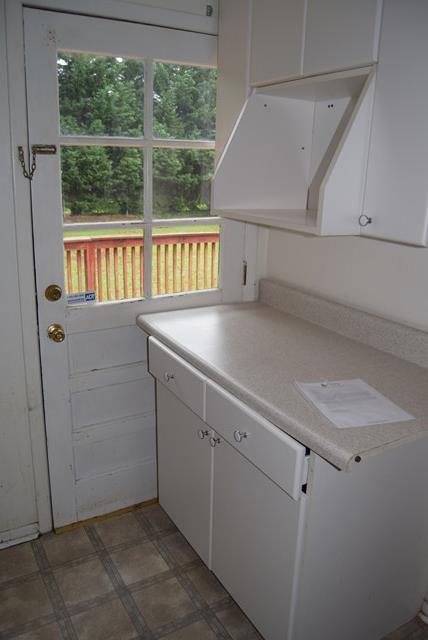 1608 Macon Road Perry, GA 31069 - Photo 5 of 11 a view of storage and utility room with a sink