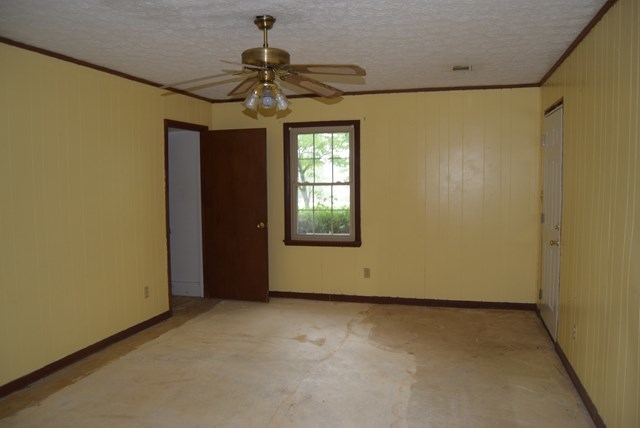 1608 Macon Road Perry, GA 31069 - Photo 6 of 11 a view of an empty room with a window