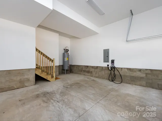 a view of an empty room with windows