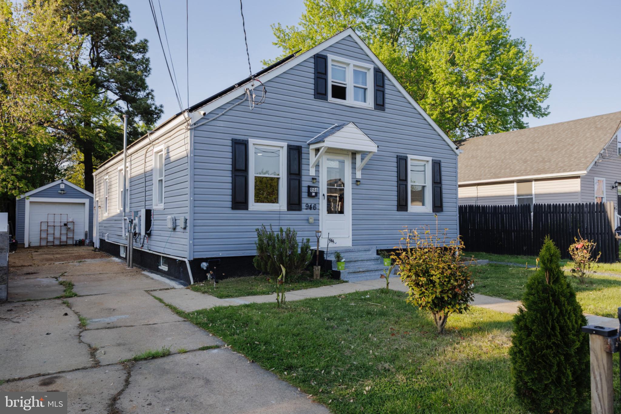 946 Martin Road Essex, MD 21221 - Photo 4 of 48 Charming blue home with inviting curb appeal.