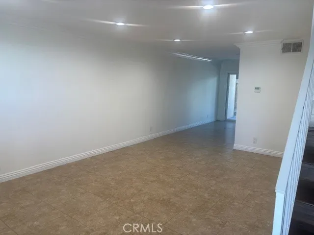 an empty room with a natural light