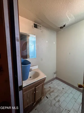 a view of a storage and utility room in a small room