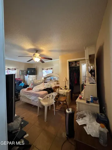 a room with furniture and a flat screen tv