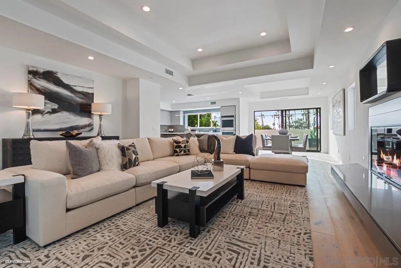 8352 La Jolla Shores Drive La Jolla, CA 92037 - Photo 9 of 33 a living room with furniture or couch and a flat screen tv