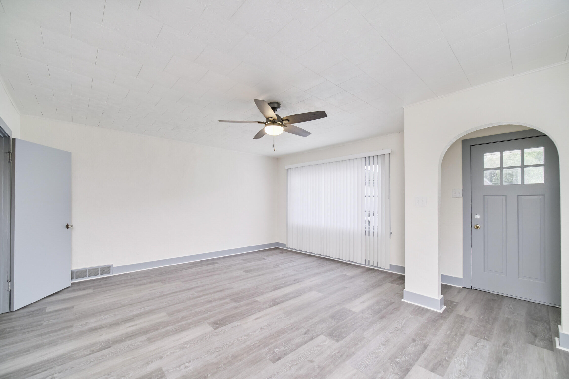 711 Ramsdell Street Manistee, MI 49660 - Photo 6 of 34 Newer vinyl flooring